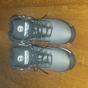 Grey and Black Timberlands